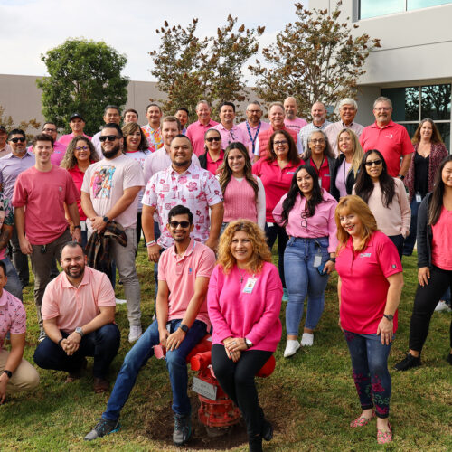 Group of people wearing pink in support of the Breast Cancer Awareness 2023